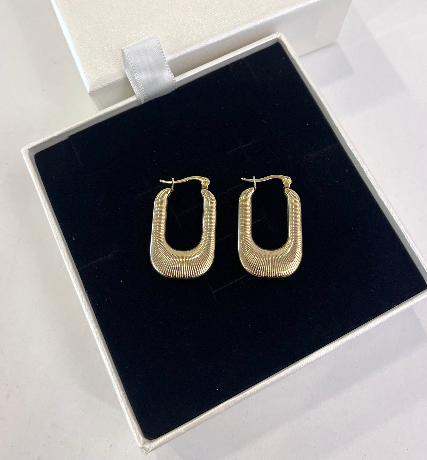 Orecchini rigati oro